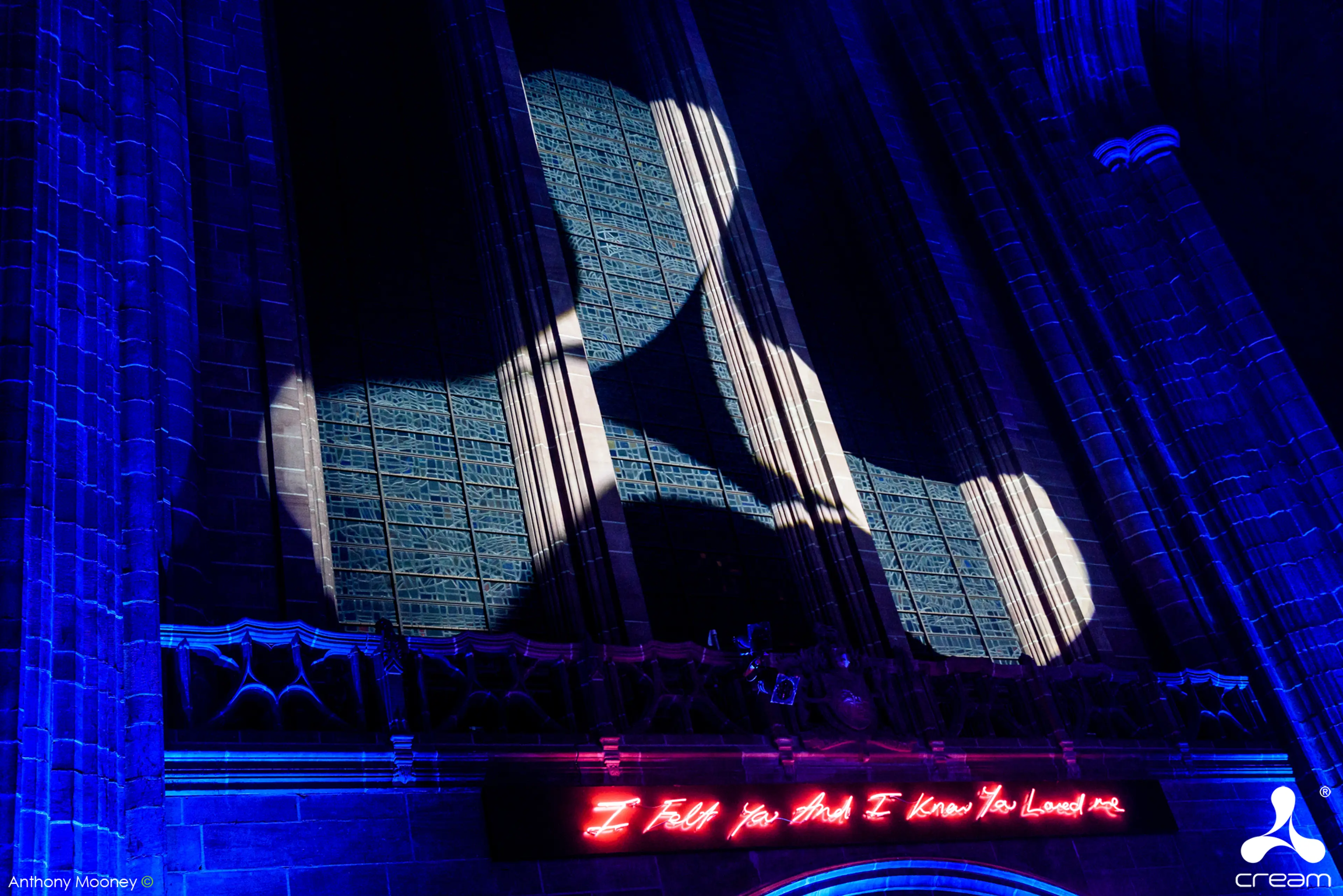 the cream logo on the side of the cathedral