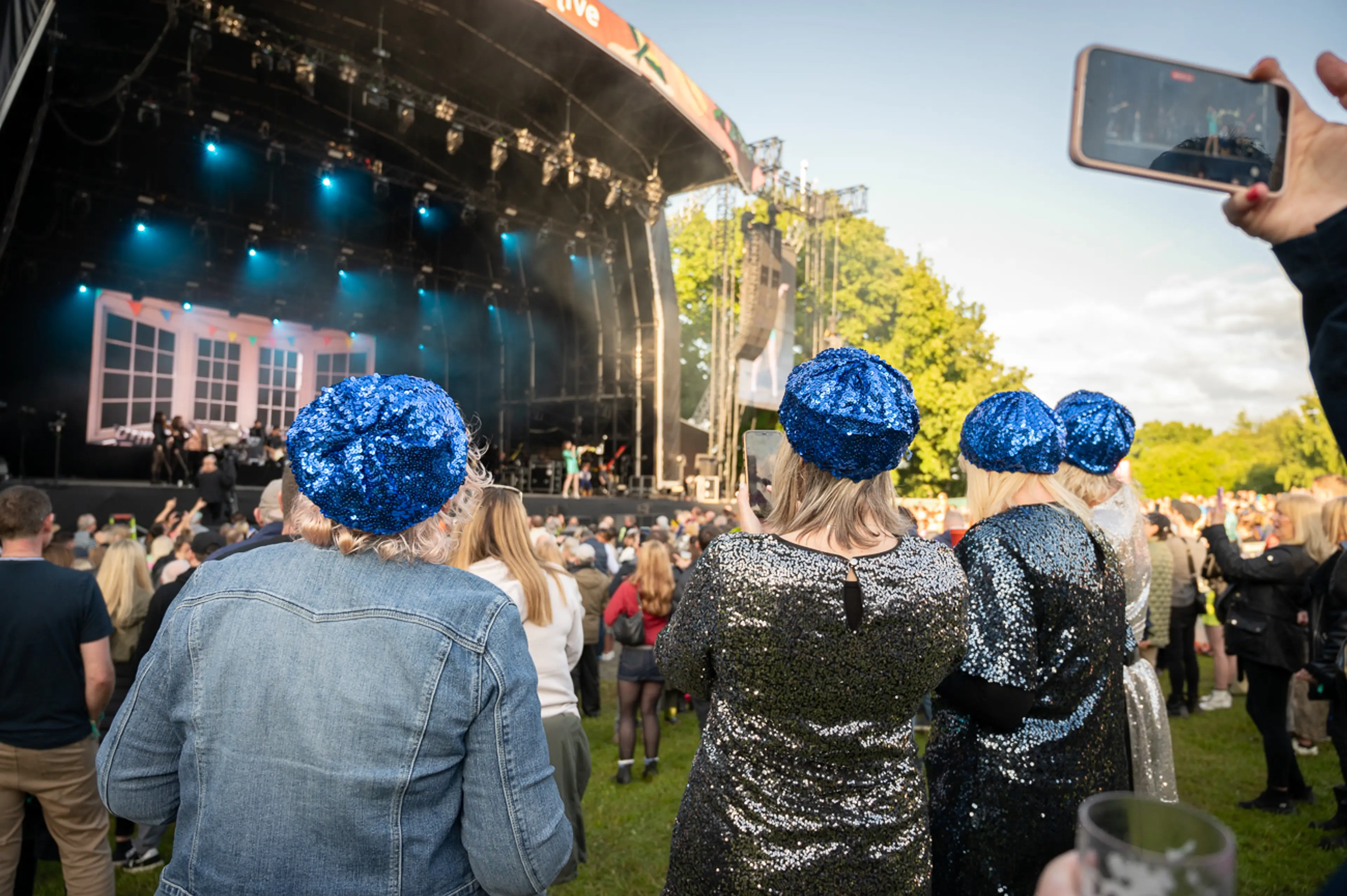 Three women watching Sophie Ellis-Bextor from Glade VIP